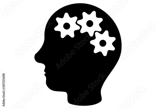 Silueta de persona pensando y reflexionando con los engranajes  de la mente