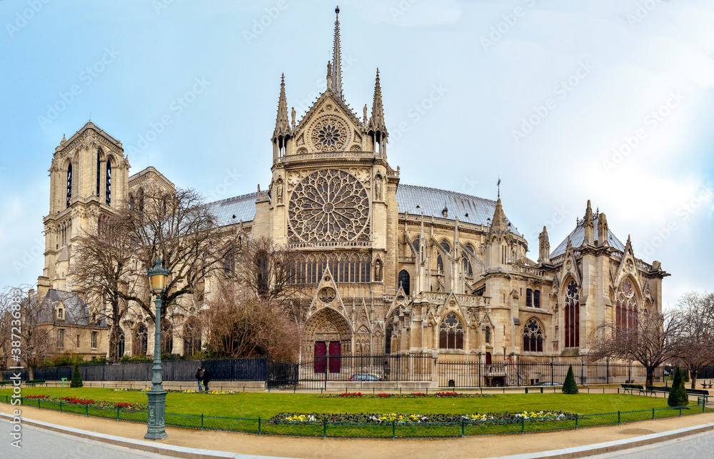 Gorgeous sunset over Notre Dame cathedral by day