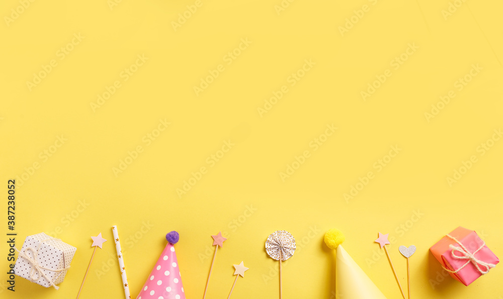 Bright gift boxes on a yellow background. Concept for birthday, mother's day, valentines day, father's day
