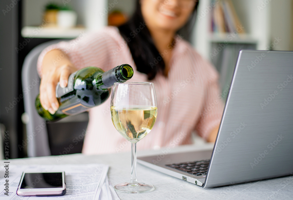 A Young Asian woman happily pouring white wine chatting on webcam with  friends/ family social distance new normal lifestyle after the coronavirus  spread. social distancing concept Stock Photo | Adobe Stock
