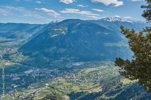 Panoramic view from a mountain in South Tyrol, Italy. Panoramic lookout from the mountains in South Tyrol. View on Bolzano and Merano. © loopzn