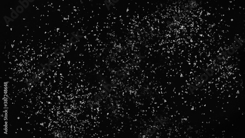 white artificial snow on black background. Wide