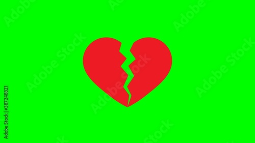  animation of broken heart icon separated   on green background. 4k video	
