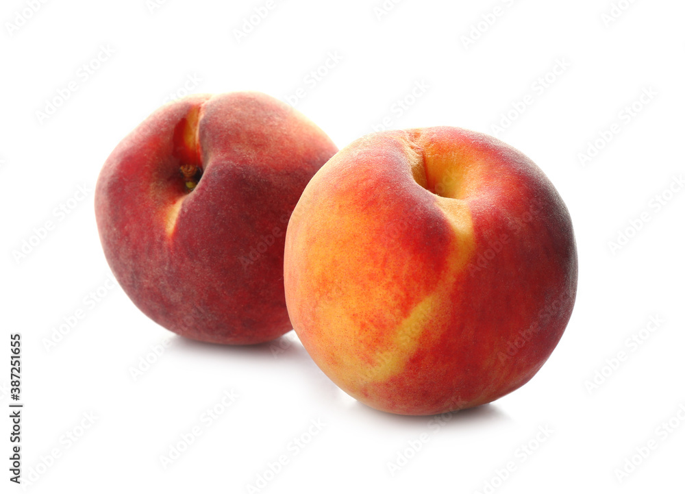Delicious ripe juicy peaches isolated on white Delicious ripe juicy peaches isolated on white