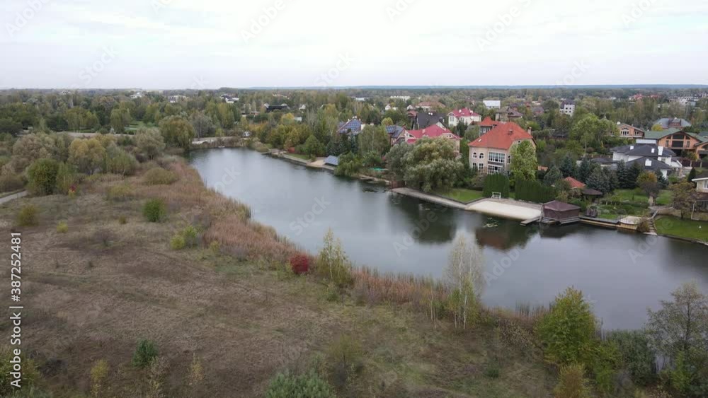 Suburban village on the river bank Suburban village on the river bank