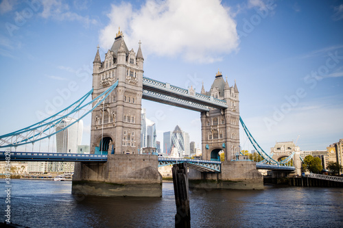 Landscape View of Tower Bridge with a Cityscape and Blue Sky as Background