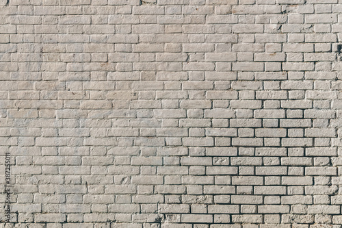 Background and texture of old rough gray brick wall 