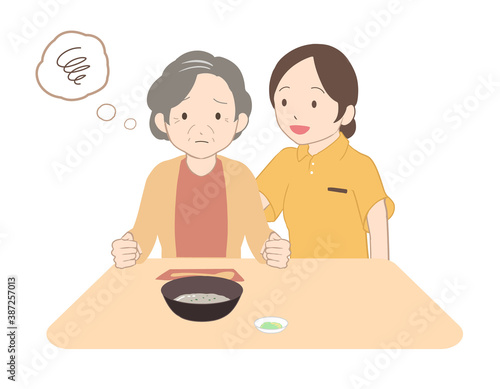 お粥を食べない高齢女性　女性介護士(線無し)