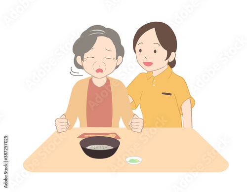 お粥嫌がる高齢女性　女性介護士(線無し)