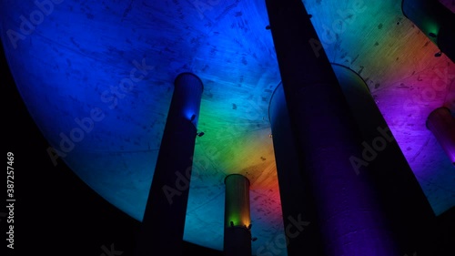Espoo, Finland - October 20, 2020: Colorful light show on old water tower at Haukilahti, that is transformed to be used as restaurant