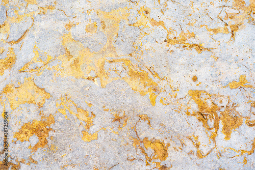 concrete aged texture. old, vintage gold, Violet background. orange with roughness and cracks