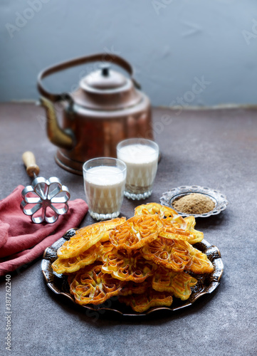 Indian rose cookies, achappam, Achu Murukku indian christmas food photo