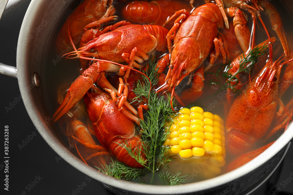 Fresh delicious crayfishes in pot, closeup view Fresh delicious crayfishes in pot, closeup view