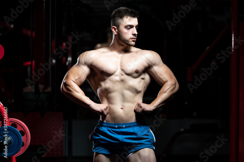 Bodybuilder Flexing Front Lat Spread Pose