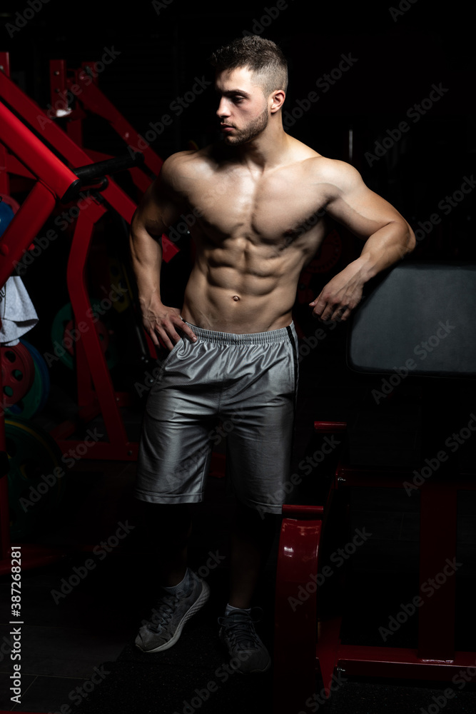Tired Trainer After Training With Gym Weights Tired Trainer After Training With Gym Weights