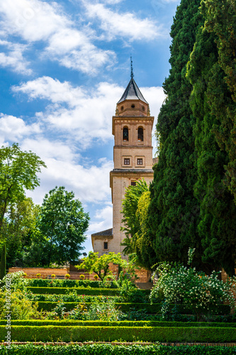 Alhambra Palace Bell Tower Granada Spain with terraced gardens in the foreground photo