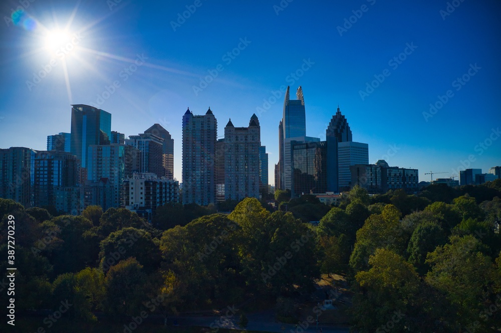 Beautiful aerial shot of Piedmont park and Atlanta skyline shot during golden hour by drone