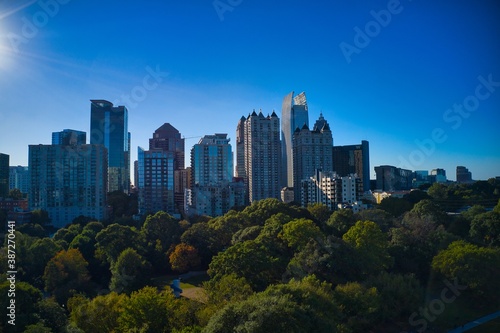 Beautiful aerial shot of Piedmont park and Atlanta skyline shot during golden hour by drone