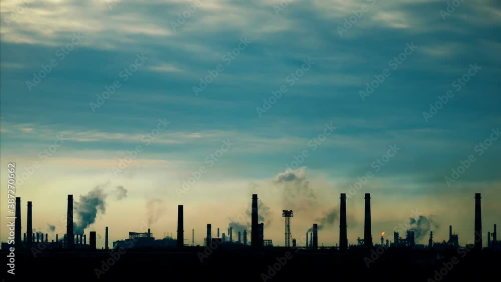 Industrial chimneys time lapse. Metallurgy blue sky. Metallurgical industrial factory. Poisoned air. Epic pollution of nature. Toxic substances. Industrial chimneys time lapse. Metallurgy blue sky. Metallurgical industrial factory. Poisoned air. Epic pollution of nature. Toxic substances.