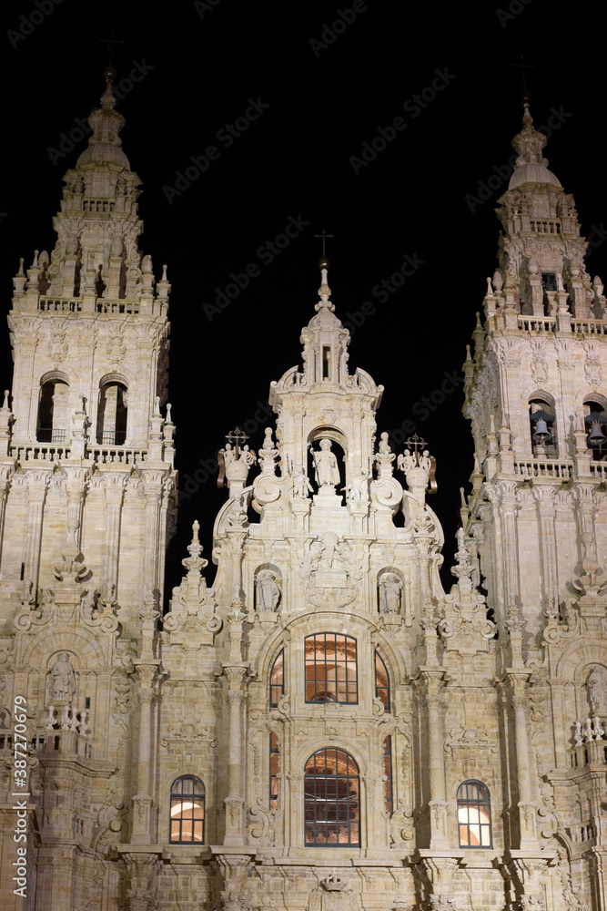 Facade of the Cathedral of Santiago de Compostela in Spain illuminated at night