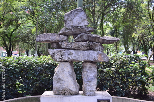 stone statue in a garden