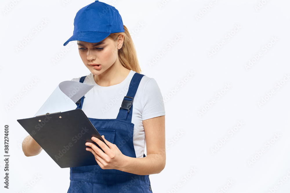 Working woman in uniform documents delivery service courier services Working woman in uniform documents delivery service courier services