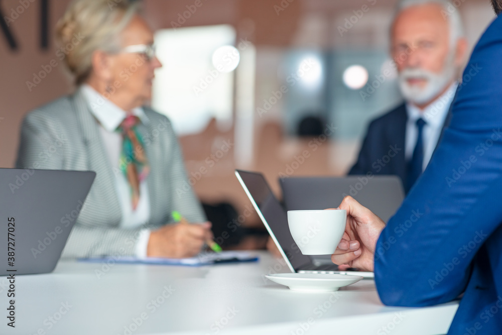 Group of business persons in discussion. Working together. Group of business persons in discussion. Working together.