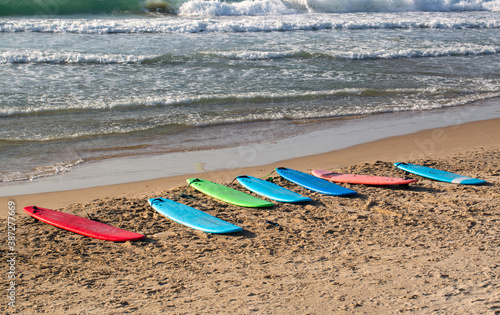 Colorful Surfboards on beach. water sports. Healthy Active Lifestyle. Surfing. Summer Vacation. Extreme Sport.