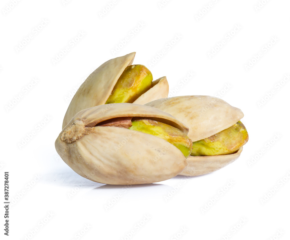Pistachio nuts. Isolated on a white background Pistachio nuts. Isolated on a white background