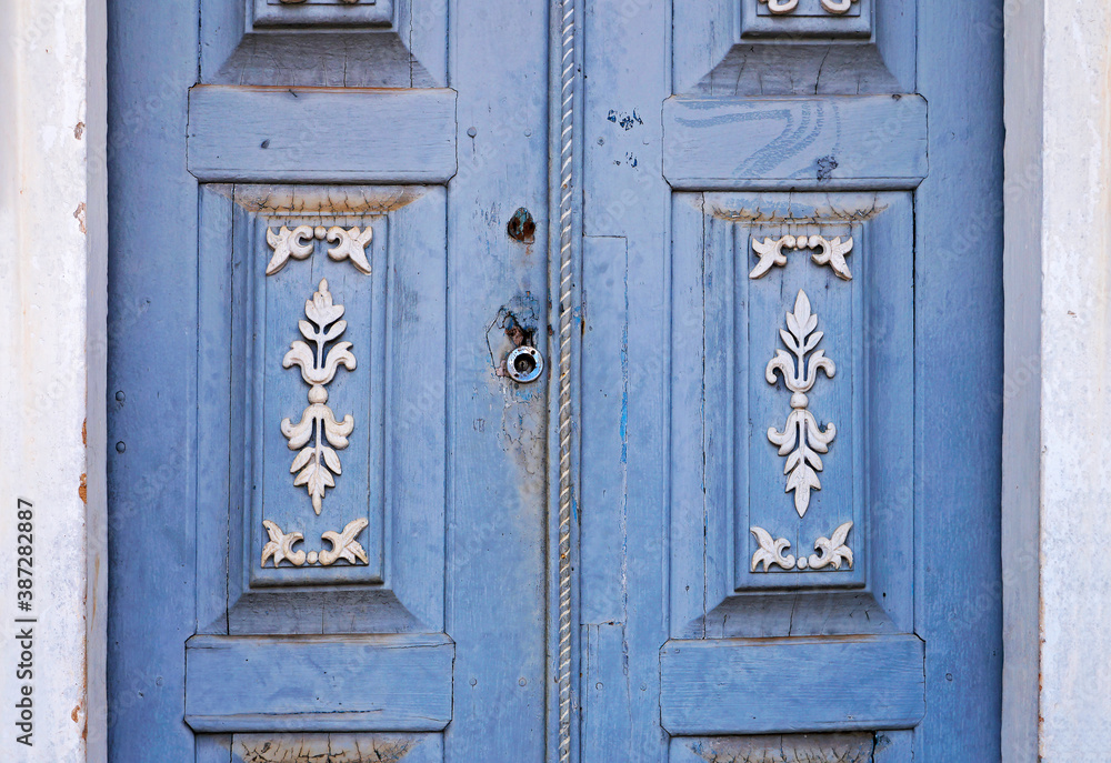 Chapel door ornament (detail) in historical city of Serro, Brazil 