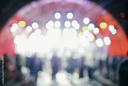 Fotografie Defocused entertainment concert lighting on stage, blurred disco party, Concert Live and The fashion show background