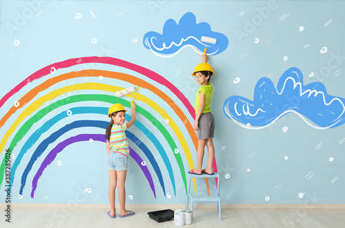 Children painting colorful ...