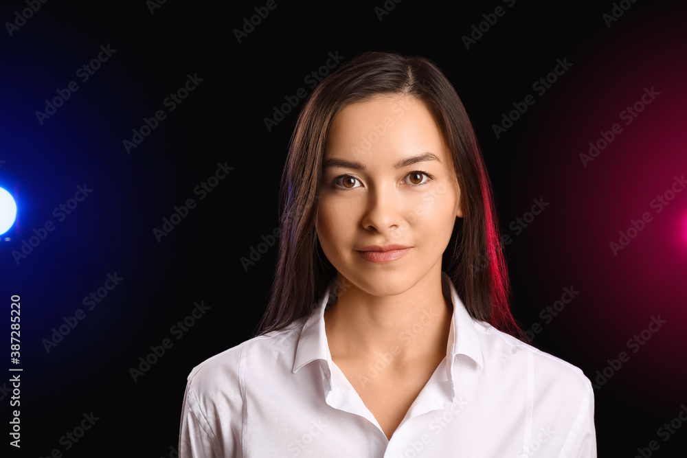 Young talented actress on dark background Young talented actress on dark background