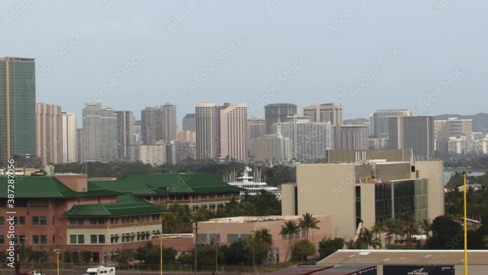 Downtown Honolulu, Oahu, Hawaii, wide shot of the city.Prince Jonah Kuhio Kalanianaole Federal Building, Honolulu, Oahu, Hawaii. Downtown Honolulu, Oahu, Hawaii, wide shot of the city.Prince Jonah Kuhio Kalanianaole Federal Building, Honolulu, Oahu, Hawaii.
