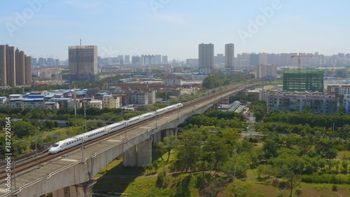 aerial view of railway bridge and trian 