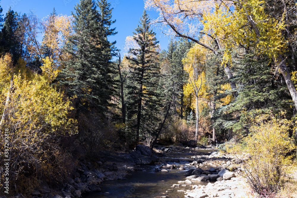 Pecos River in autumn in the Santa Fe National Forest of New Mexico is a great place to hike along the water and beautiful rocks Pecos River in autumn in the Santa Fe National Forest of New Mexico is a great place to hike along the water and beautiful rocks