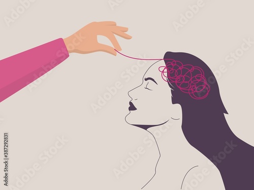Psychotherapy or Psychology concept. Helping hand unravels the tangle of thoughts of a woman with mental disorder, anxiety and confusion mind