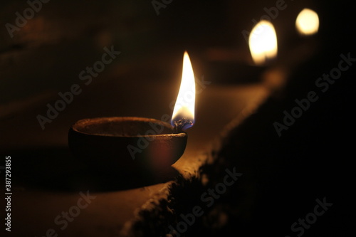 burning candles in the dark, Lit up the lamp , let the dark leave , our home shine 