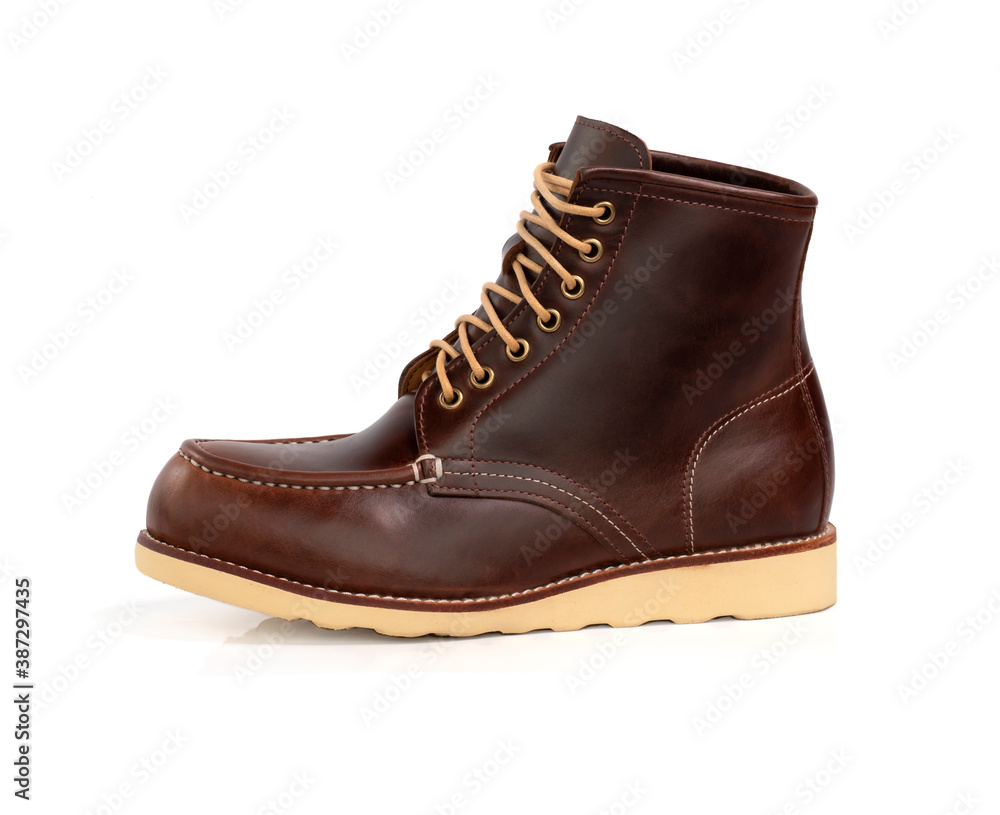 Men fashion leather brown boot isolated on white background. side view Men fashion leather brown boot isolated on white background. side view