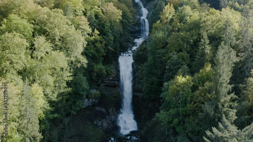 Flying Towards The Majestic Giessbach Waterfall In Brienz, Switzerland During Autumn - aerial drone Flying Towards The Majestic Giessbach Waterfall In Brienz, Switzerland During Autumn - aerial drone