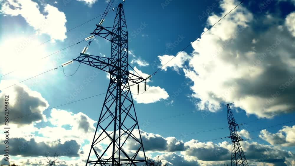 Power Lines And Blue Sky Time Lapse.High Voltage Electricity ...