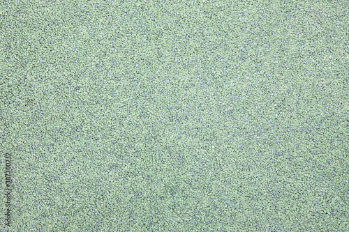 Green gravel texture or surface. photo