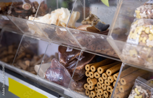 Assortment of different pet feed for sale in shop