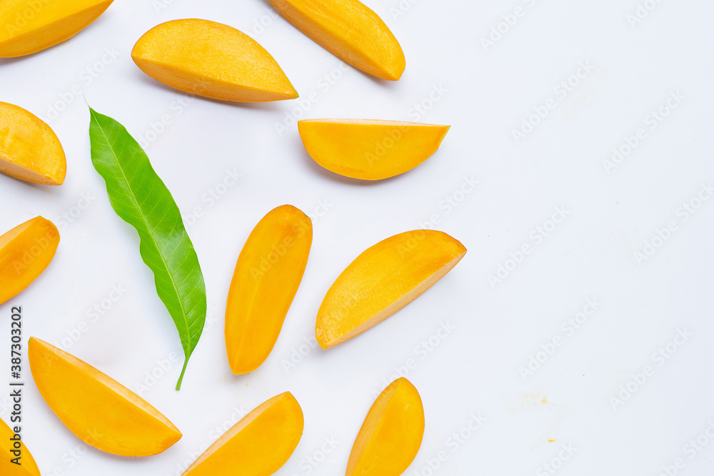 Tropical fruit, Mango slices on white background. Tropical fruit, Mango slices on white background.