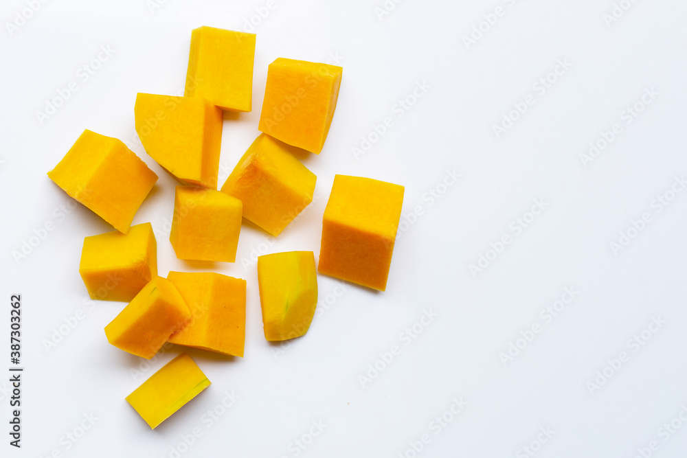 Cut and slices butternut squash on white background. Cut and slices butternut squash on white background.