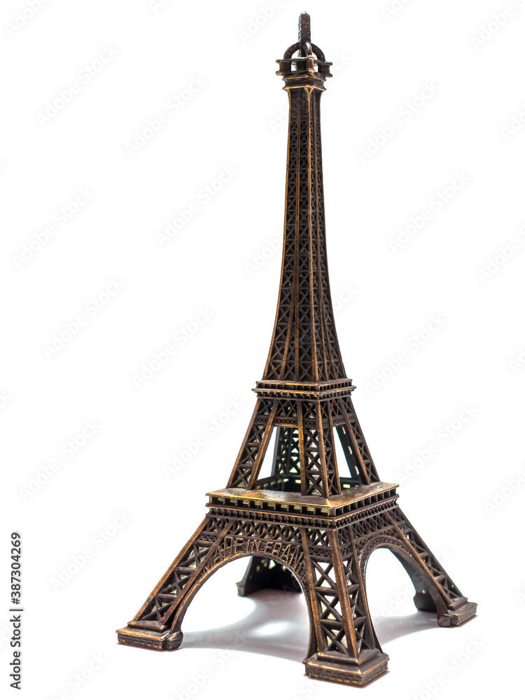 A bronze copy of the the Eiffel Tower, Paris. Object is isolated on the white background.