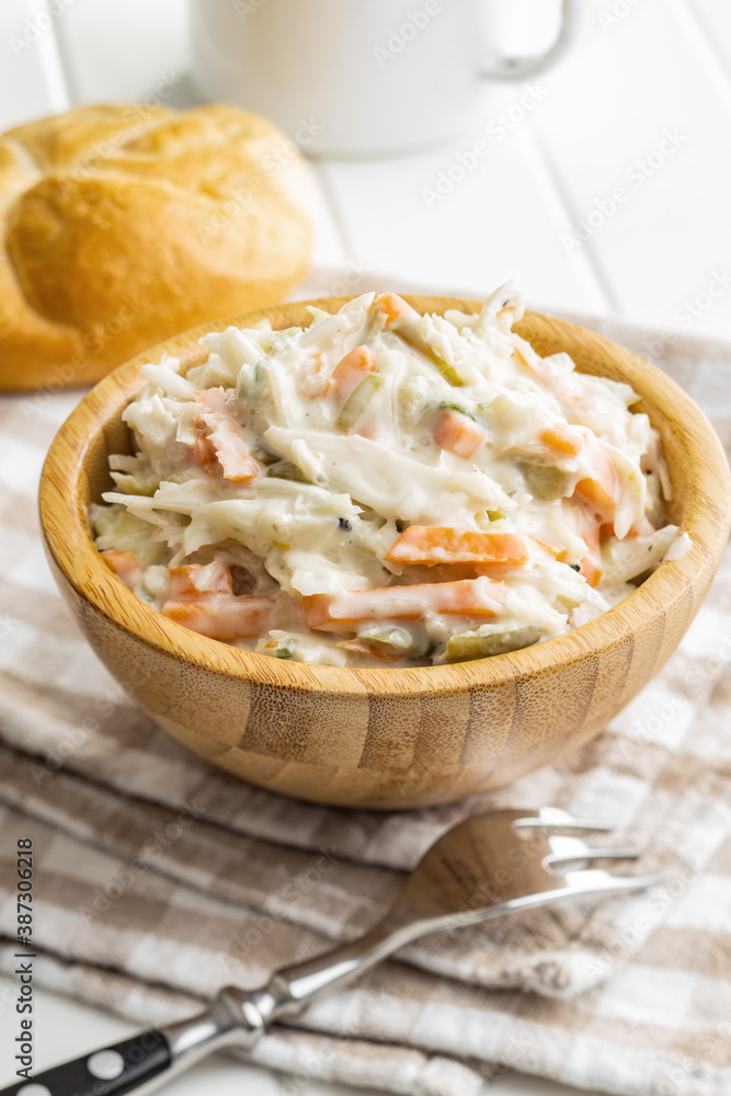 Coleslaw. Salad made of shredded white cabbage and grated carrot with mayonnaise.