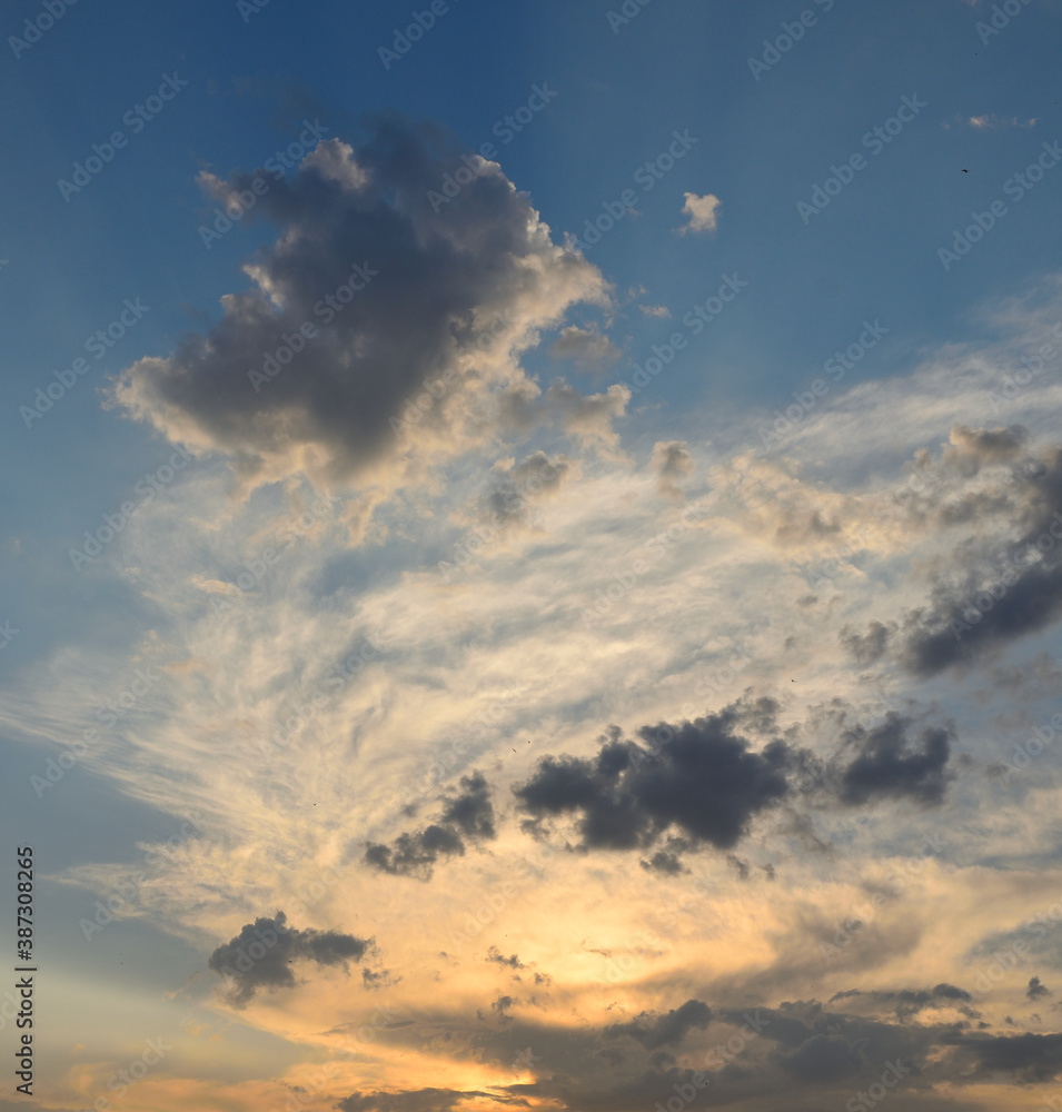 Sunset time in the city, sky light, clouds Sunset time in the city, sky light, clouds