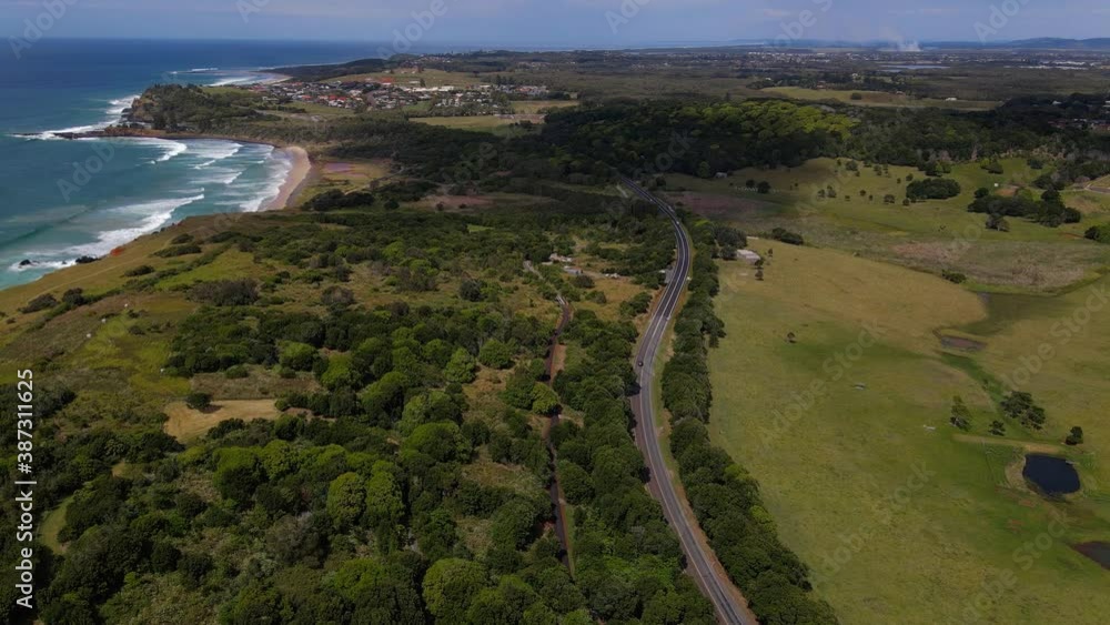 Scenic Aerial View Of The Coast Road - Lennox Head, New South Wales - drone shot Scenic Aerial View Of The Coast Road - Lennox Head, New South Wales - drone shot