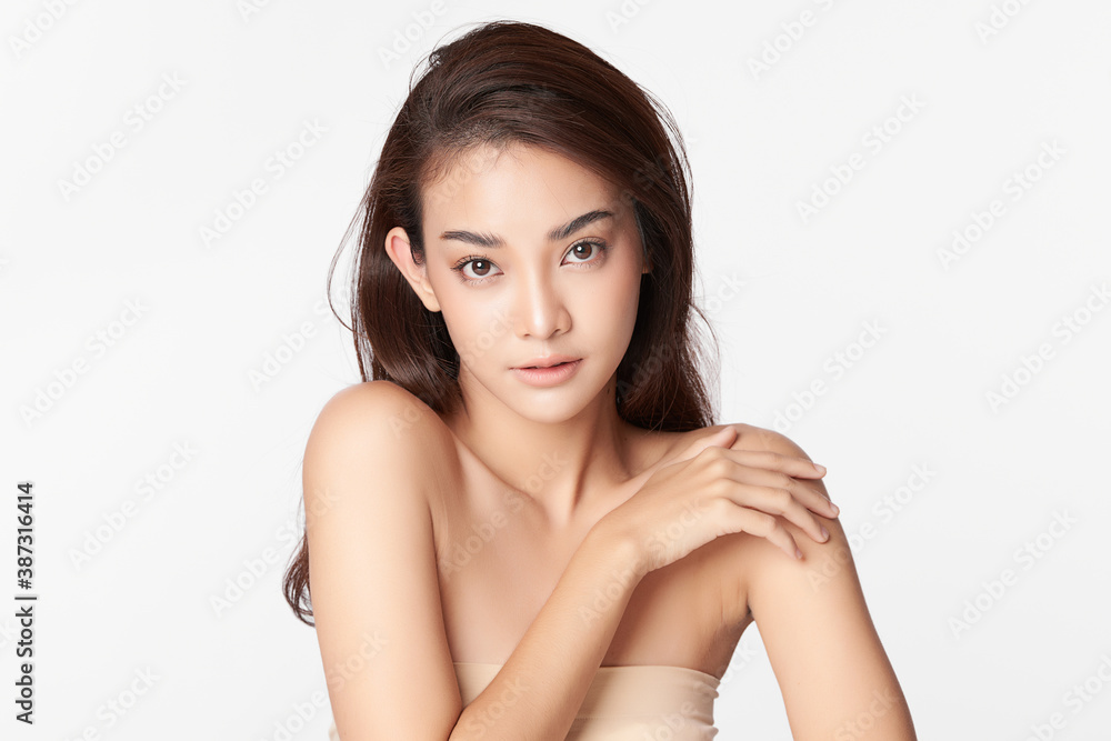 Beautiful young asian woman with clean fresh skin on white background, Face care, Facial treatment, Cosmetology, beauty and spa, Asian women portrait Beautiful young asian woman with clean fresh skin on white background, Face care, Facial treatment, Cosmetology, beauty and spa, Asian women portrait